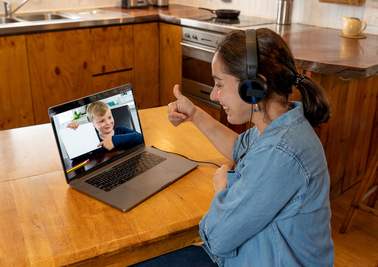 teacher video chatting with student