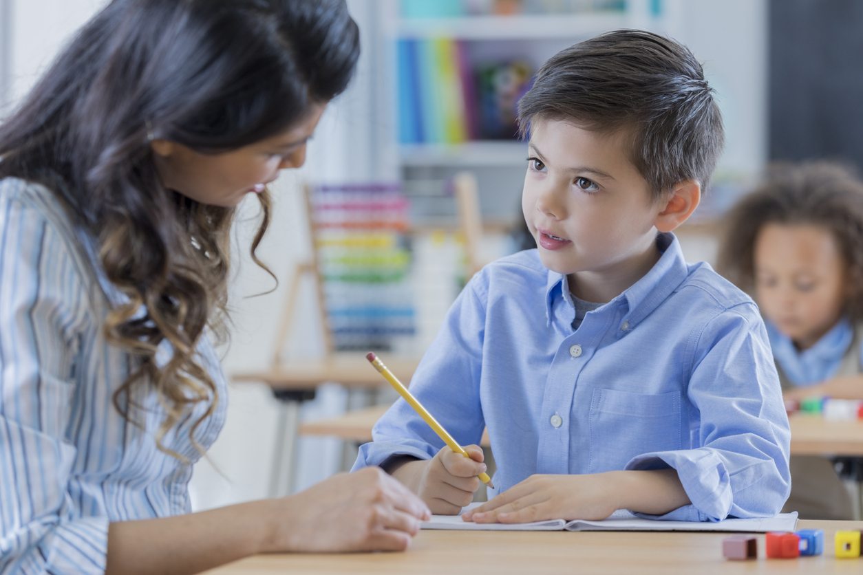 student with teacher