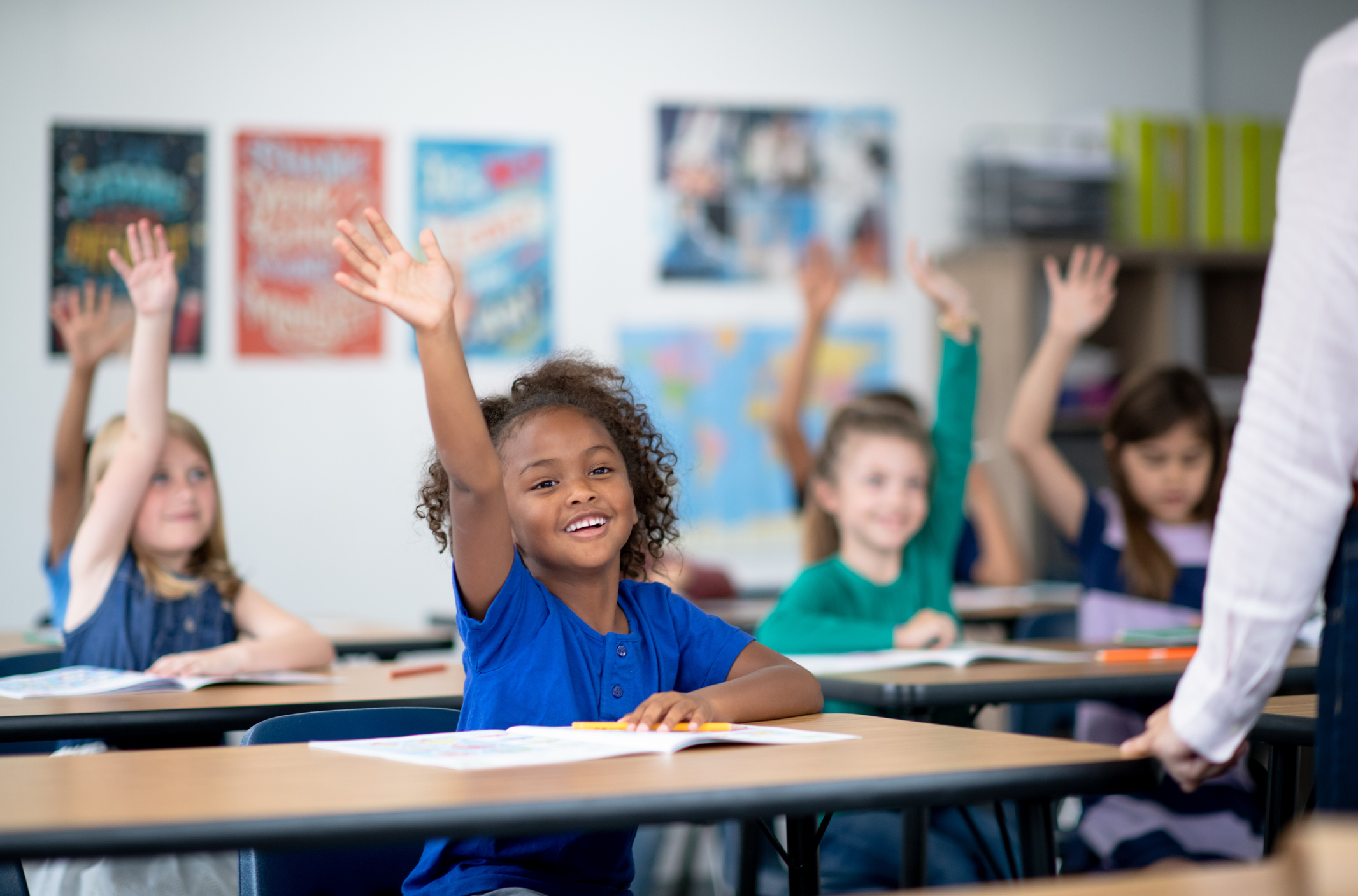 student raising hand